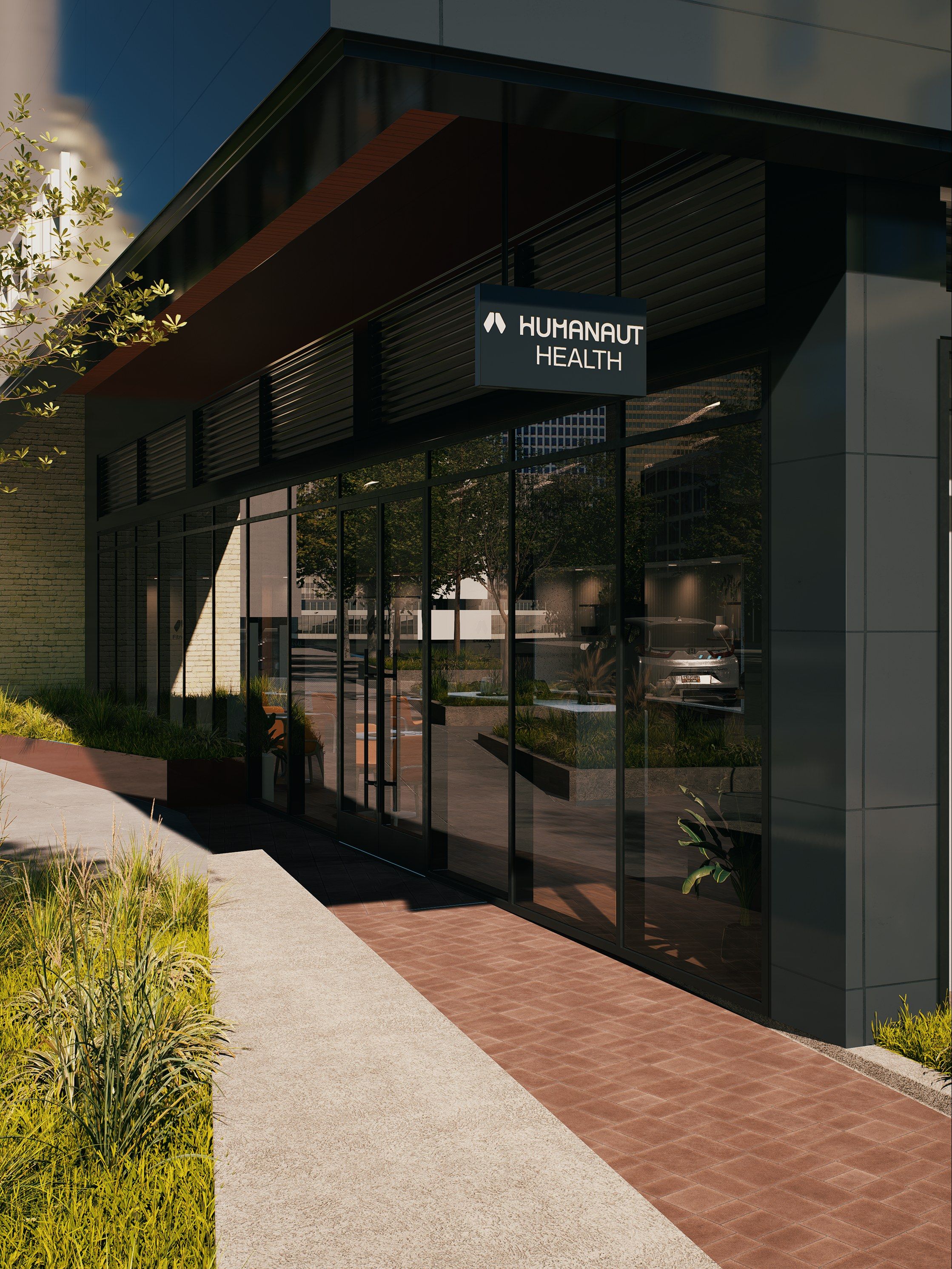 Humanaut Health Austin clinic exterior at dusk