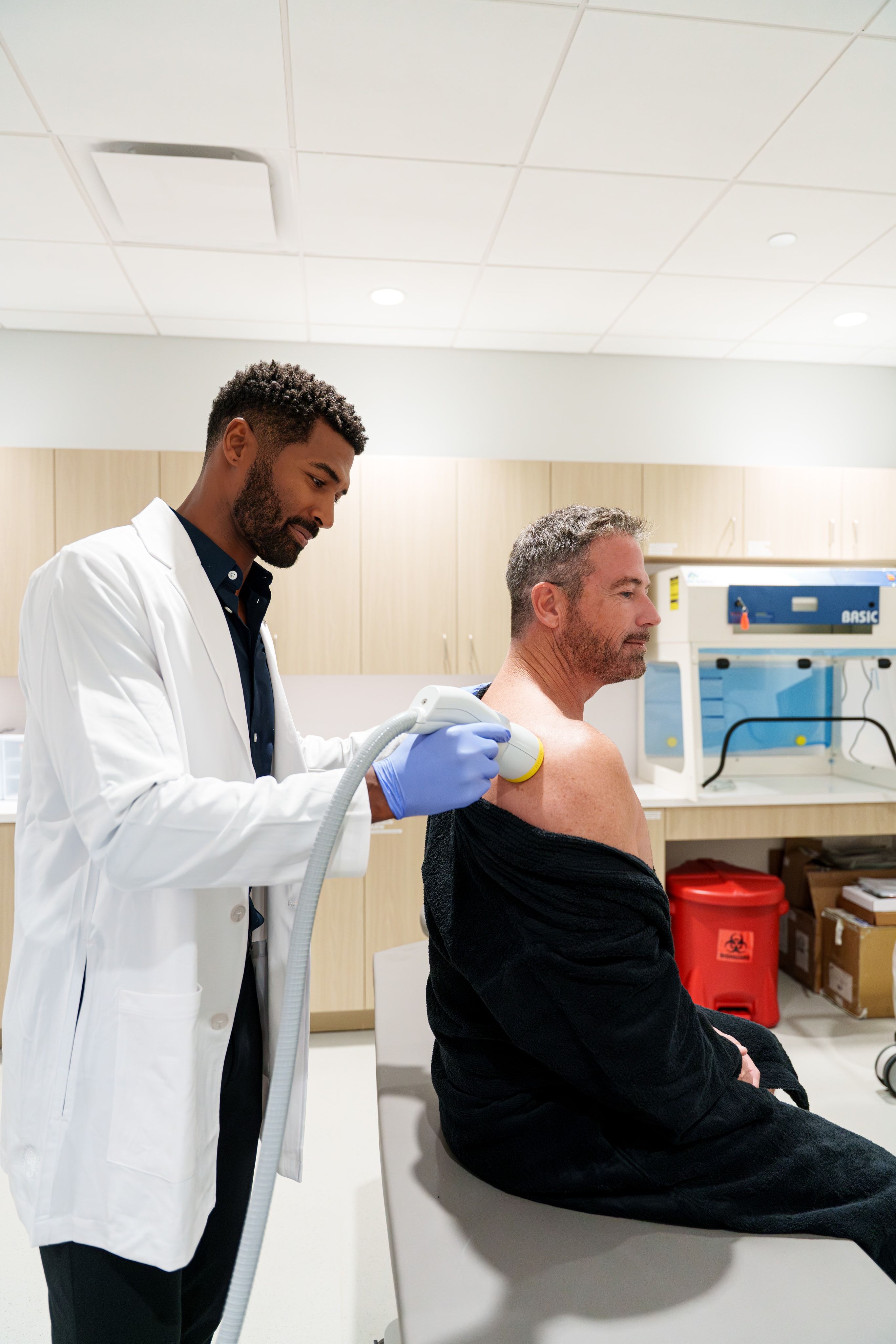 Shockwave therapy session — clinic photography