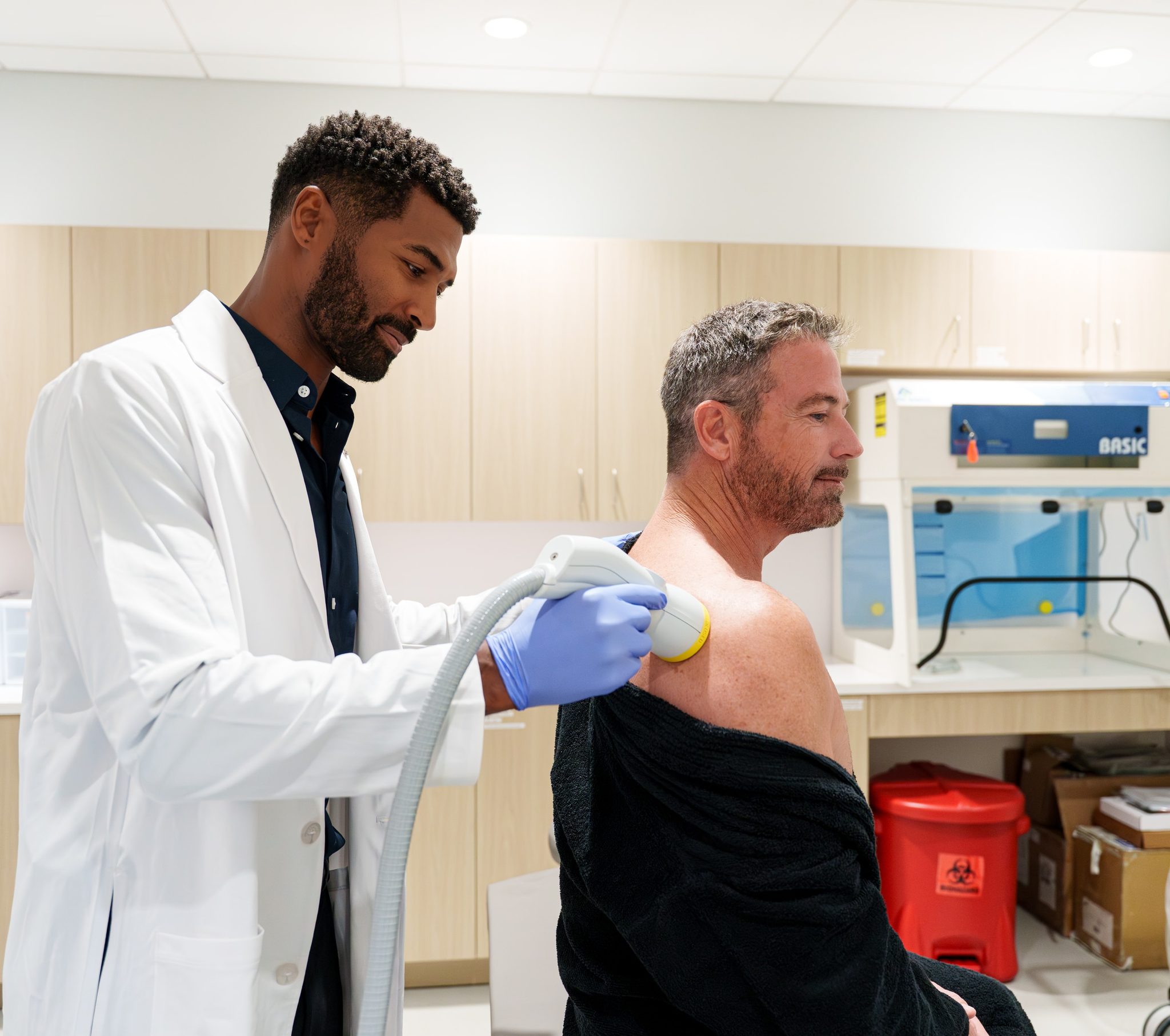 Shockwave therapy session — clinic photography