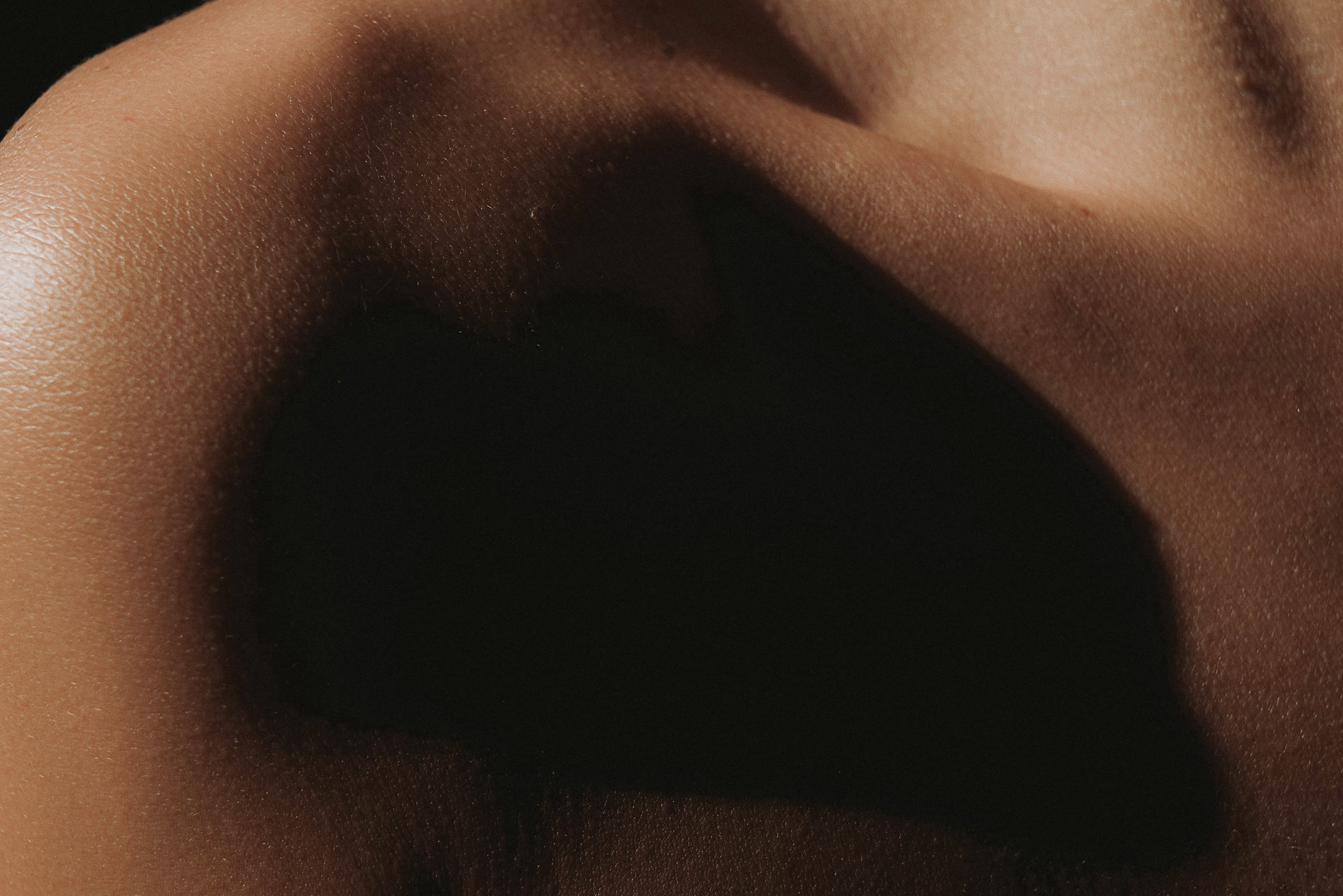 Close-up skin texture conveying the body's depth and detail