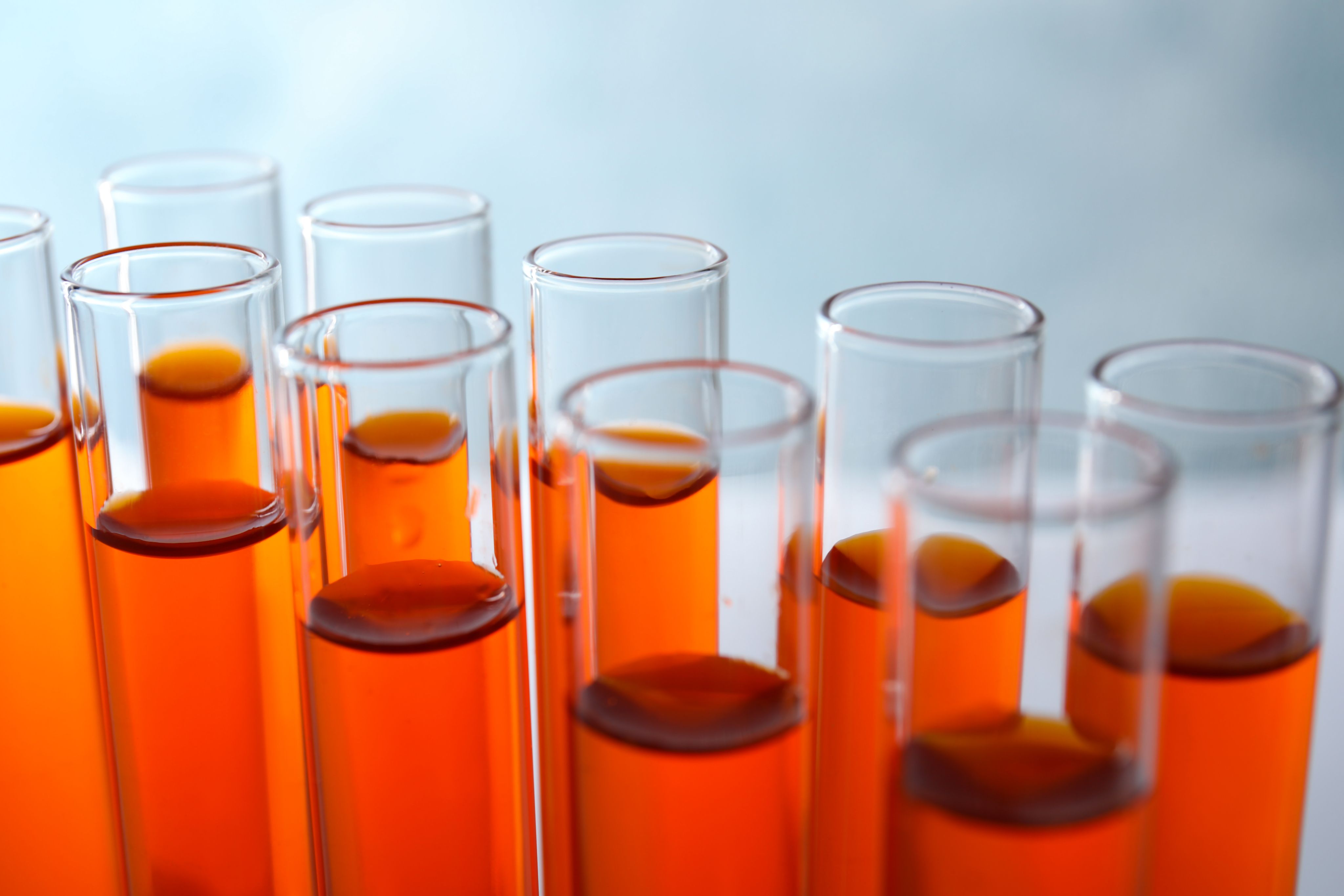 Lab vials of biomarker samples lined up for testing