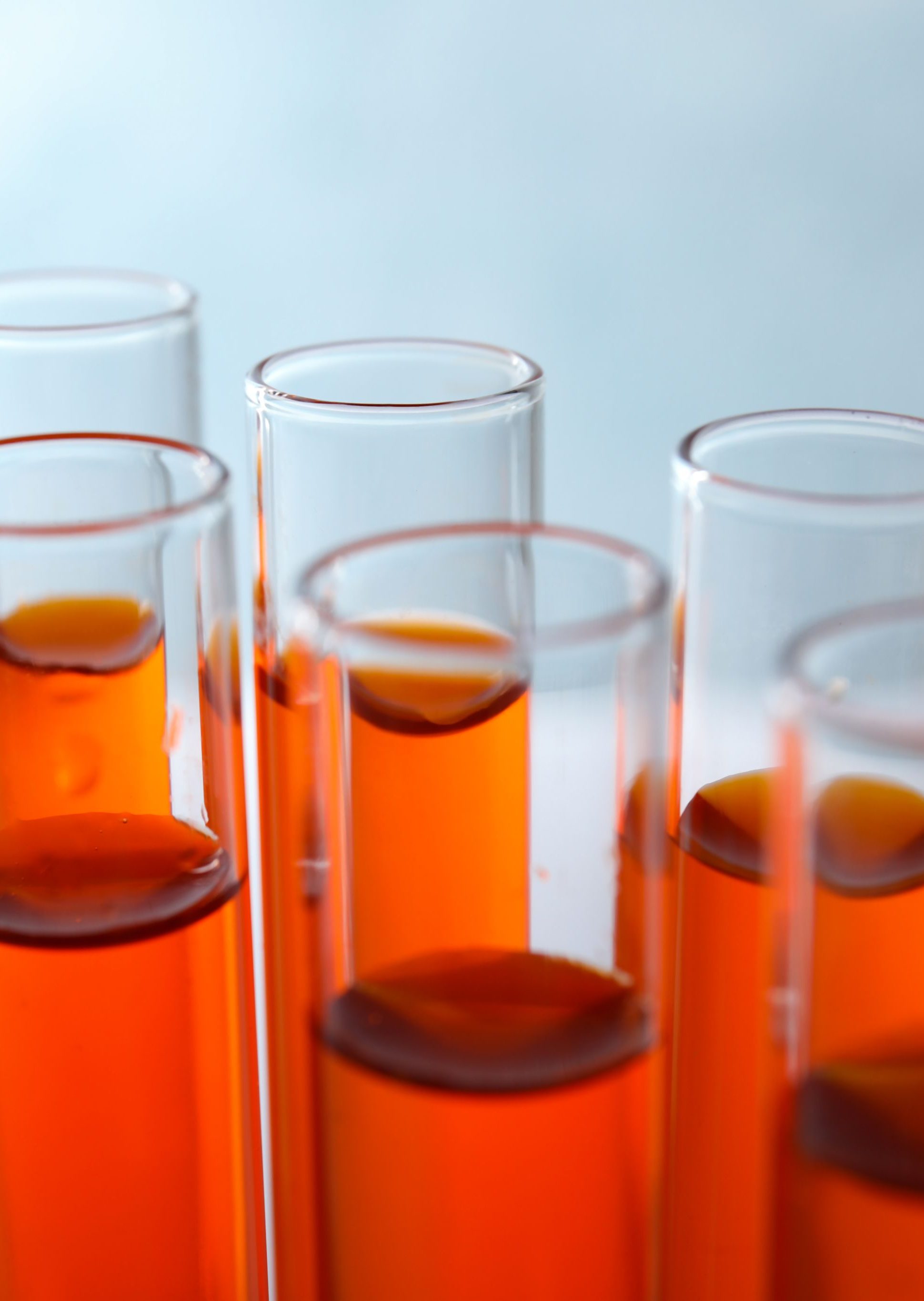 Lab vials of biomarker samples lined up for testing