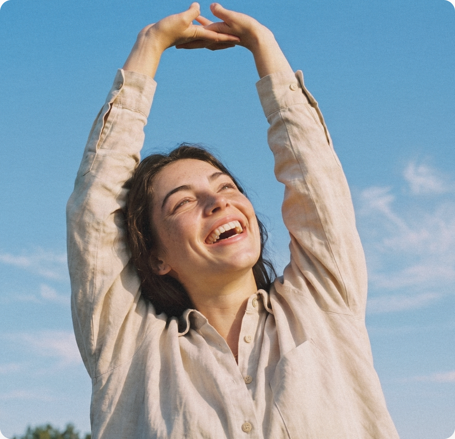 Woman stretching in the sunlight