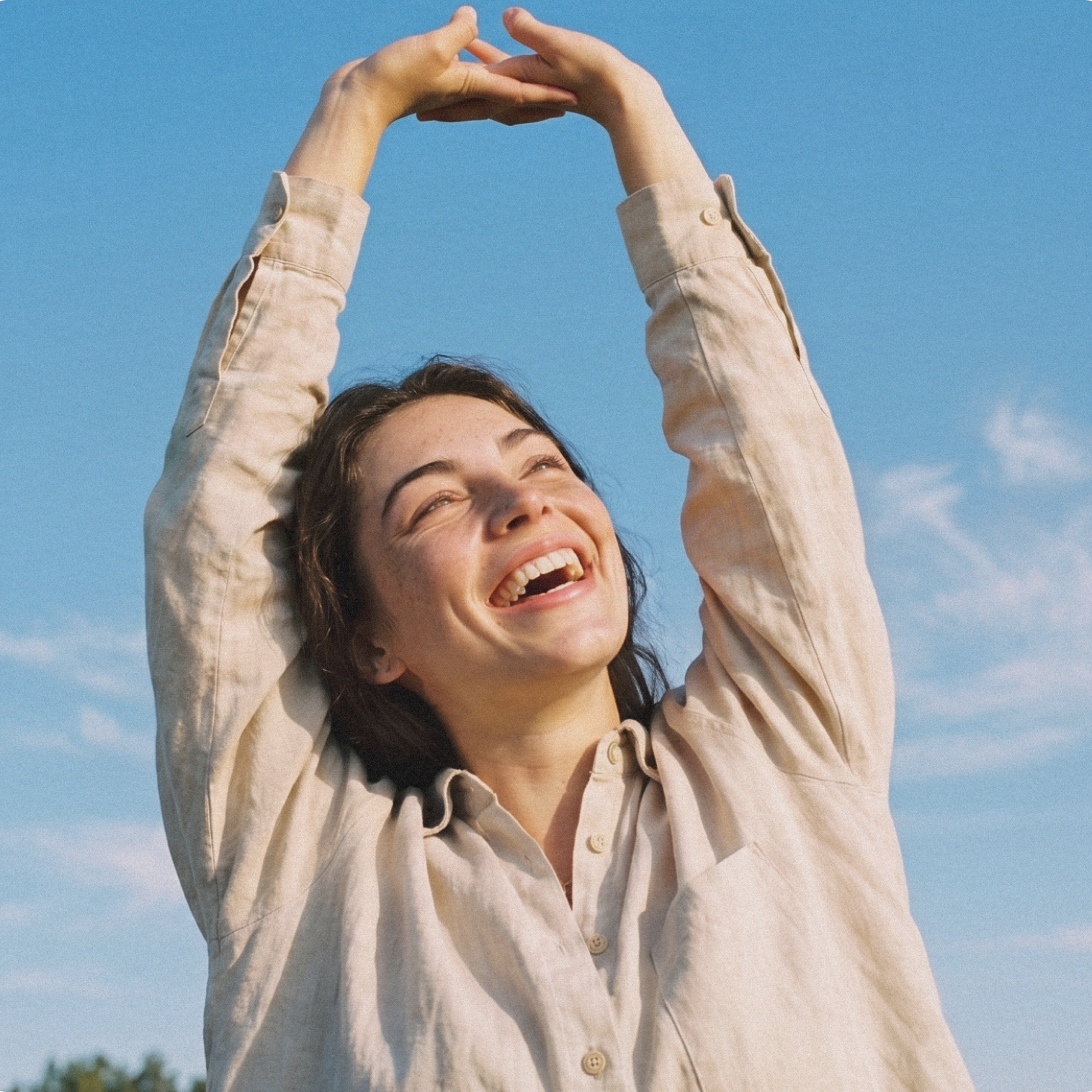 Woman stretching in the sunlight