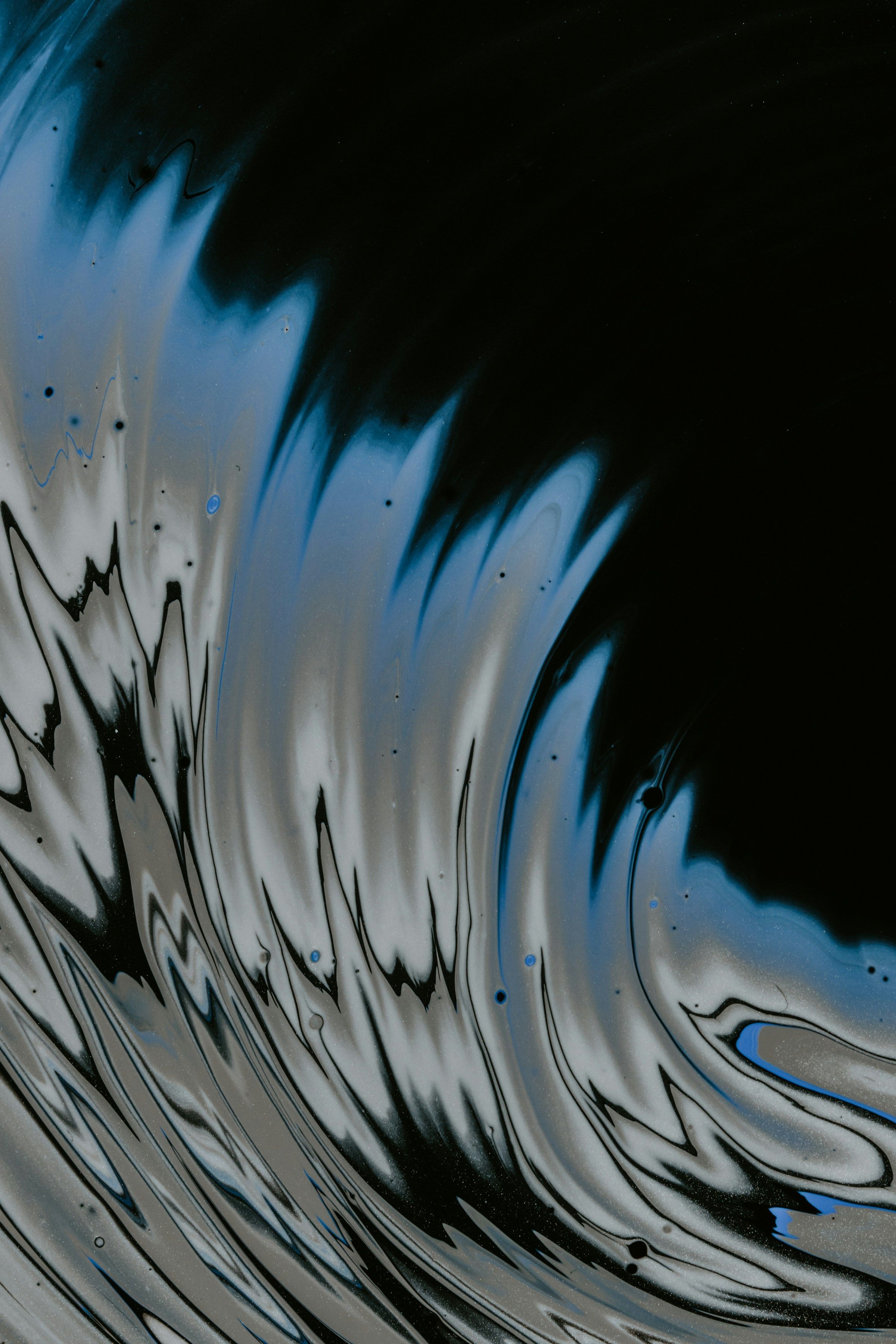 Dark fluid texture behind the Shiftwave benefits overlay