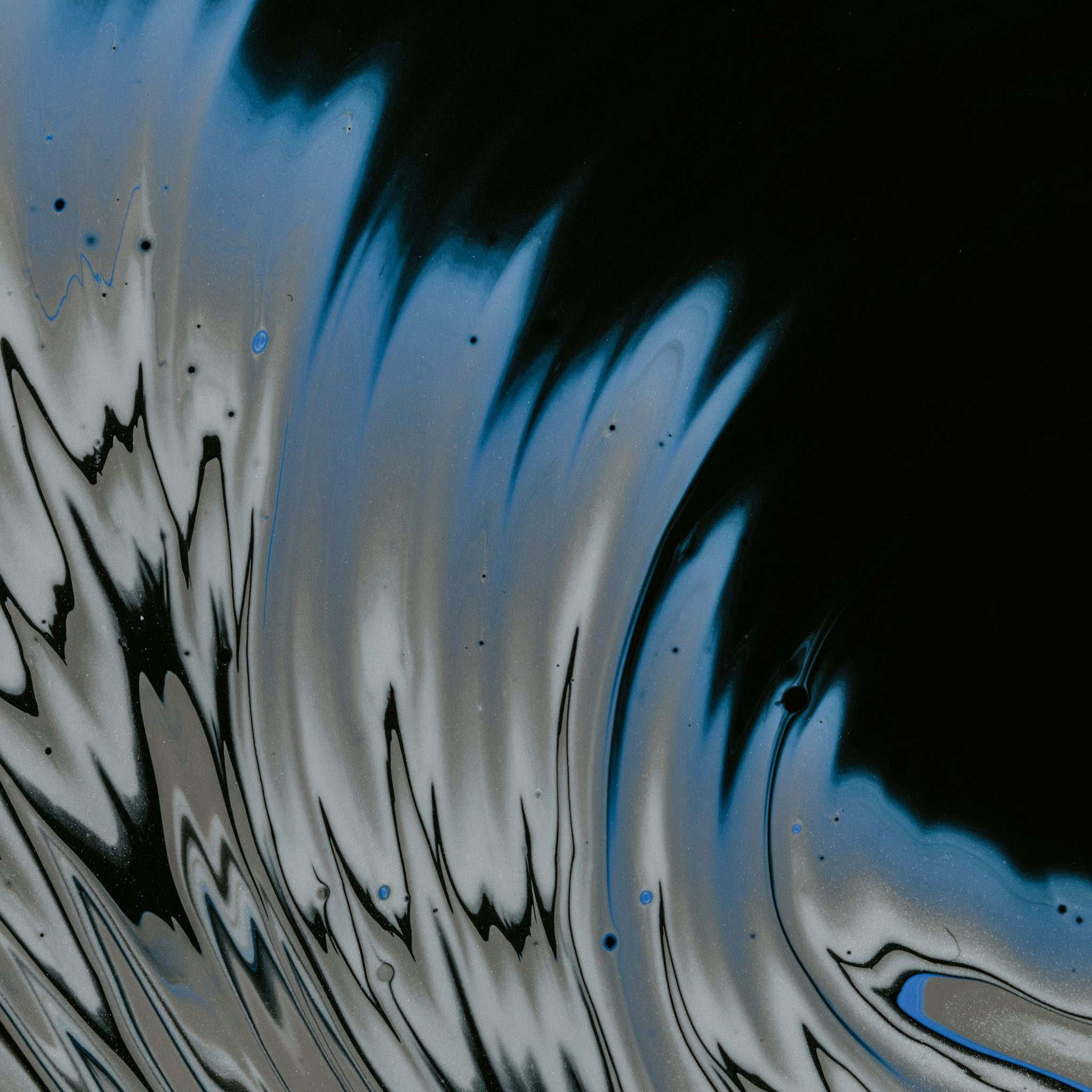Dark fluid texture behind the Shiftwave benefits overlay